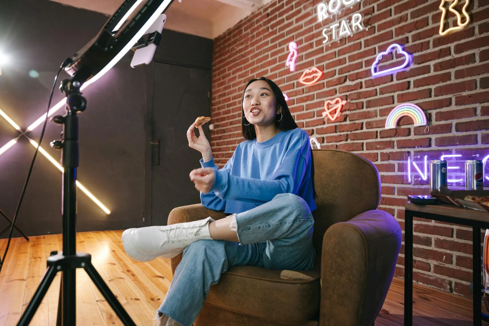 Creator filming a video in a home studio